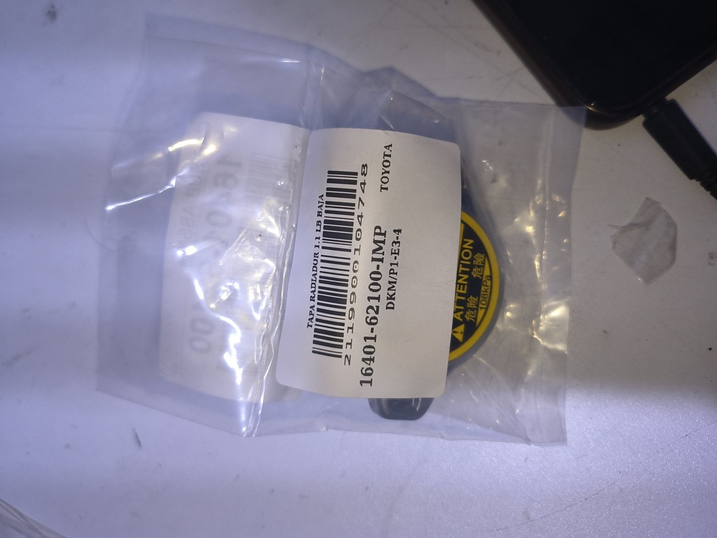 [16401-62100-IMP] TAPA RADIADOR 1.1 LB BAJA